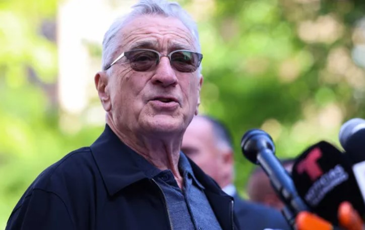 Hecklers criticize De Niro's films during a public appearance.  Image Credits: Getty