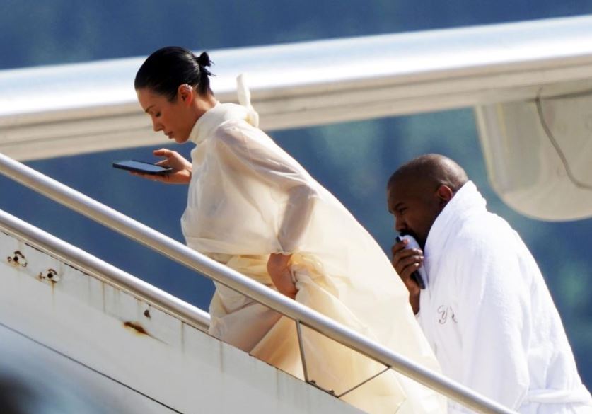 Despite their previous wealth, Kanye and Bianca opted for the economy, surprising many. Image Credits: Getty
