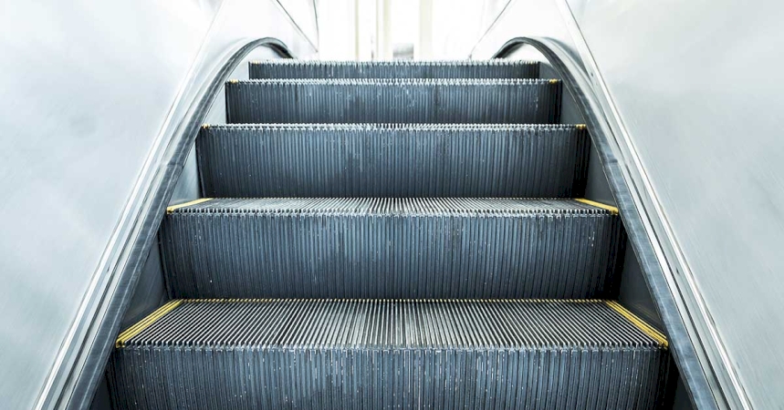 The Scary Reason Behind Escalators Having Brushes On The Side