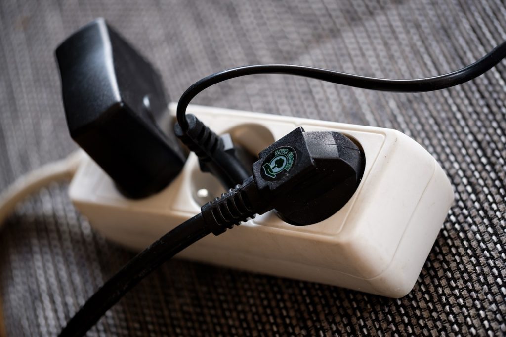 A close up of a travel power strip. 