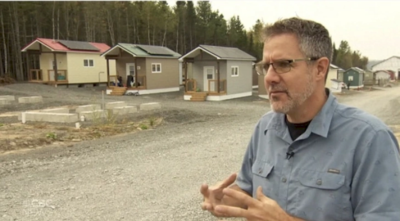 A millionaire decided to help his community by building almost 100 houses for homeless people in his town.